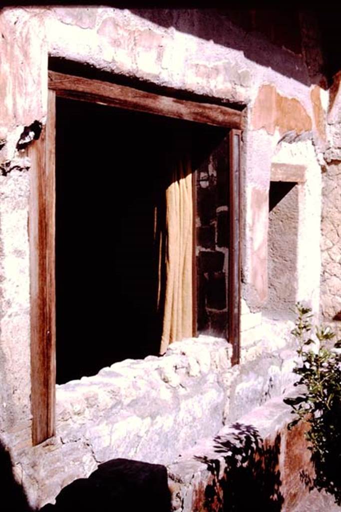 Ins. V.5, Herculaneum. 1964. Window on north side of garden. Photo by Stanley A. Jashemski.
Source: The Wilhelmina and Stanley A. Jashemski archive in the University of Maryland Library, Special Collections (See collection page) and made available under the Creative Commons Attribution-Non Commercial License v.4. See Licence and use details. J64f1172